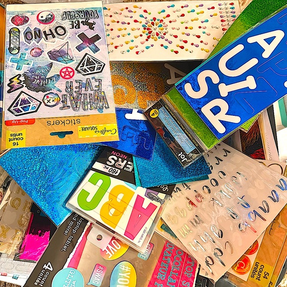 Box of 2000+ stickers, scrapbook paper, unopened glue bottles/sticks, paint pens - Picture 1 of 5